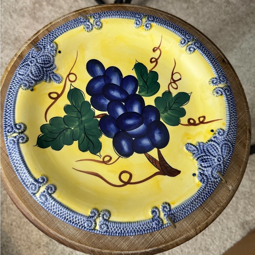 Vibrant Yellow Plate with Grapes Design